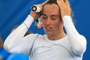 Dolgopolov Jr reacts after a point