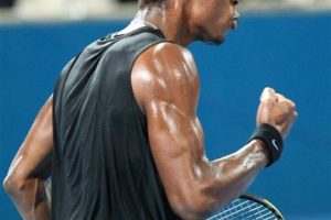 Gael Monfils pumps up his fist in celebration