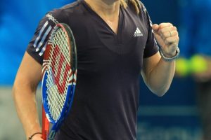 TENNIS - BRISBANE INTERNATIONAL - QUEENSLAND - AUSTRALIA - 7th January 2009. JUSTINE HENIN takes a sigh of relief after downing MELINDA CZINK during Action from the womans main draw 1/4 finals between JUSTINE HENIN ( BEL ) and MELINDA CZINK ( HUN )  at the 2010 Brisbane International from Pat Rafter ARENA. . PHOTO SCOTT POWICK