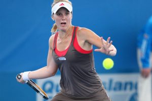 Isabella Holland of Australia hitting a backhand