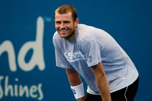 Mardy Fish is entertained by Andy Roddick during their practice session. Tennis Australia.