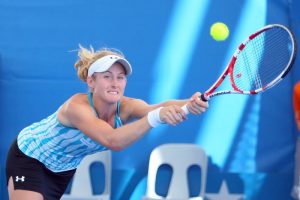 Jess Moore chases a backhand.