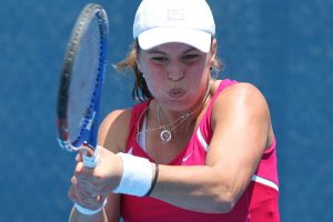 Anna Tatishvili hits a backhand.