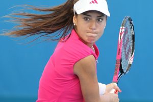 Sorana Cirstea clad in pink in her match against Chanelle Scheepers where she won 6-3 4-6 6-4.
