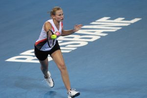 Jelena Dokic put a nervous start behind her under lights, thumping her way into the second round.