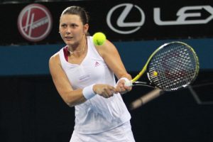 Klaudia Jans hits a backhand during the women's doubles final. SMP IMAGES