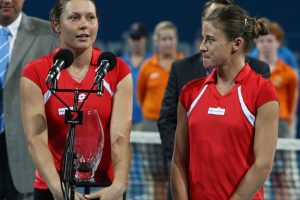 Runners-up Klaudia Jans and Alicja Rosolska address the Pat Rafter Arena crowd. SMP IMAGES