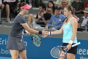 Alisa Kleybanova (left) and Anastasia Pavlyuchenkova celebrate winning a point. SMP IMAGES