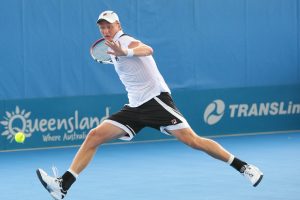 Greg Jones stretches for a forehand in his final-round qualifying loss to fellow Aussie Matt Ebden.