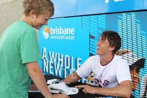 Brisbane boy John Millman signed autographs for fans ahead of his first-round clash with fellow Aussie Matt Ebden.