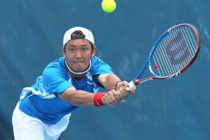 Japan's Tatsuma Ito got the ball but lost to Adrian Mannarino, of France.