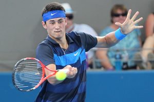 Bernard Tomic was unable to build on a third straight wildcard at the Brisbane International, falling in straight sets to seventh-seed Florian Mayer.