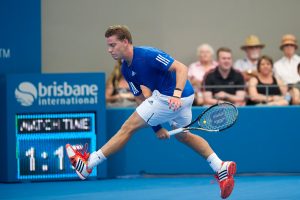 Australian teenager James Duckworth hits a tweener during his loss to second seed Gilles Simon. SMP IMAGES