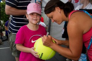 Aussie favourite Casey Dellacqua signed dozens of autographs for fans of all ages during Kids Tennis Day. SMP IMAGES