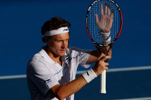 BRISBANE, AUSTRALIA - JANUARY 03:  Denis Istomin of Uzbekistan celebrates winning his match against Lleyton Hewitt of Australia on day five of the Brisbane International at Pat Rafter Arena on January 3, 2013 in Brisbane, Australia.  (Photo by Chris Hyde/Getty Images)