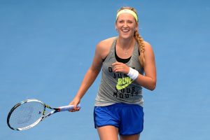 BRISBANE, AUSTRALIA - DECEMBER 31: Victoria Azarenka of Belarus shares a laugh with her training partner during a practice session ahead of the 2015 Brisbane International at Queensland Tennis Centre on December 31, 2014 in Brisbane, Australia.  (Photo by Bradley Kanaris/Getty Images)