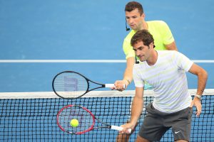 BRISBANE, AUSTRALIA - JANUARY 04:   Roger Federer and Grigor Dimitrov take part in the Pat Rafter Arena Spectacular during day one of the 2015 Brisbane International at Pat Rafter Arena on January 4, 2015 in Brisbane, Australia.  (Photo by Chris Hyde/Getty Images)