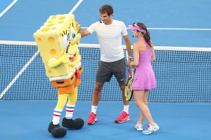 BRISBANE, AUSTRALIA - JANUARY 04:  Roger Federer and Martina Hingis take part in the Pat Rafter Arena Spectacular during day one of the 2015 Brisbane International at Pat Rafter Arena on January 4, 2015 in Brisbane, Australia.  (Photo by Chris Hyde/Getty Images)
