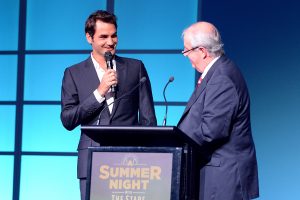 BRISBANE, AUSTRALIA - JANUARY 04:  Roger Federer talks on stage at the A Summer Night with the Stars of International Tennis at the Brisbane Town Hall on January 4, 2015 in Brisbane, Australia.  (Photo by Bradley Kanaris/Getty Images)