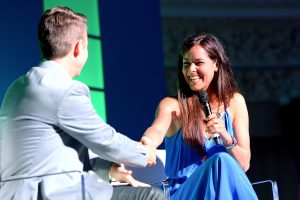 BRISBANE, AUSTRALIA - JANUARY 04:  Ana Ivanovic shares a laugh with Todd Woodbridge as they speak on stage at the A Summer Night with the Stars of International Tennis at the Brisbane Town Hall on January 4, 2015 in Brisbane, Australia.  (Photo by Bradley Kanaris/Getty Images)