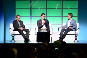 BRISBANE, AUSTRALIA - JANUARY 04:  Roger Federer, Lleyton Hewitt and Todd Woodbridge speak on stage at the A Summer Night with the Stars of International Tennis at the Brisbane Town Hall on January 4, 2015 in Brisbane, Australia.  (Photo by Bradley Kanaris/Getty Images)