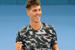 BRISBANE, AUSTRALIA - JANUARY 05:  Thanasi Kokkinakis celebrates winning his match against Julien Benneteau of France during day two of the 2015 Brisbane International at Pat Rafter Arena on January 5, 2015 in Brisbane, Australia.  (Photo by Matt Roberts/Getty Images)