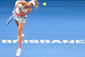 BRISBANE, AUSTRALIA - JANUARY 08: Maria Sharapova of Russia serves in her match against Carla Suarez Navarro of Spain during day five of the 2015 Brisbane International at Pat Rafter Arena on January 8, 2015 in Brisbane, Australia.  (Photo by Bradley Kanaris/Getty Images)