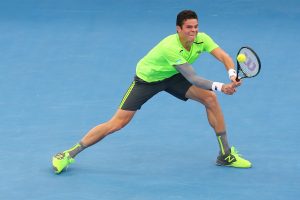 BRISBANE, AUSTRALIA - JANUARY 09:  Milos Raonic of Canada plays a backhand in his match against Sam Groth of Australia during day six of the 2015 Brisbane International at Pat Rafter Arena on January 9, 2015 in Brisbane, Australia.  (Photo by Chris Hyde/Getty Images)