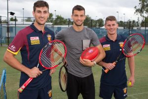 Grigor Dimitrov (BUL) meets Australian rules football Brisbane Lions players Dayne Zorko and Sam Mayes.

Tennis - Brisbane International 2015 - ATP 250 - WTA -  Queensland Tennis Centre - Brisbane - Queensland - Australia  - 8 January 2015. 
© Tennis Photo Network