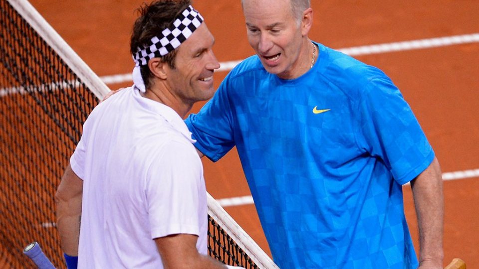 Pat Cash (L) and John McEnroe; Getty Images