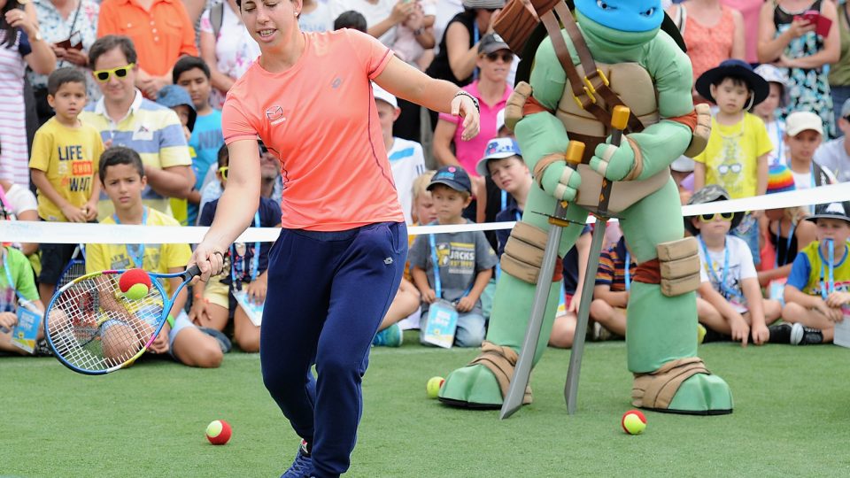 Carla Suarez Navarro of Spain plays with some young fans. Picture: GETTY IMAGES
