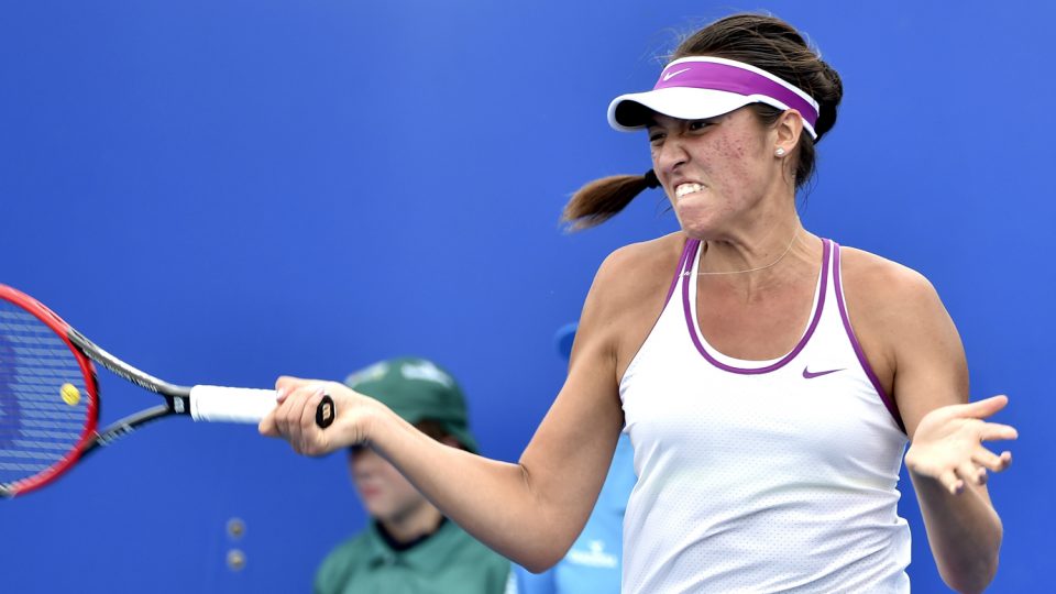Samantha Crawford of the US hits a return against Oceane Dodin of France in their first round women's singles match at the Brisbane International. Picture: GETTY IMAGES
