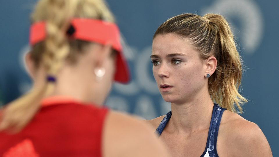 Camila Giorgi of Italy looks away from Germany's Angelique Kerber. Picture: GETTY IMAGES