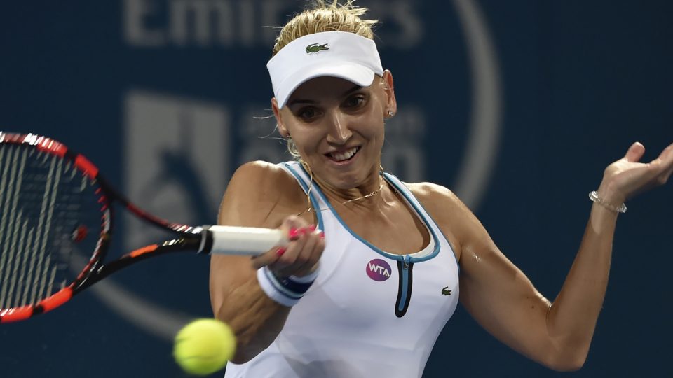 Elena Vesnina of Russia hits a return against Victoria Azarenka of Belarus. Picture: GETTY IMAGES