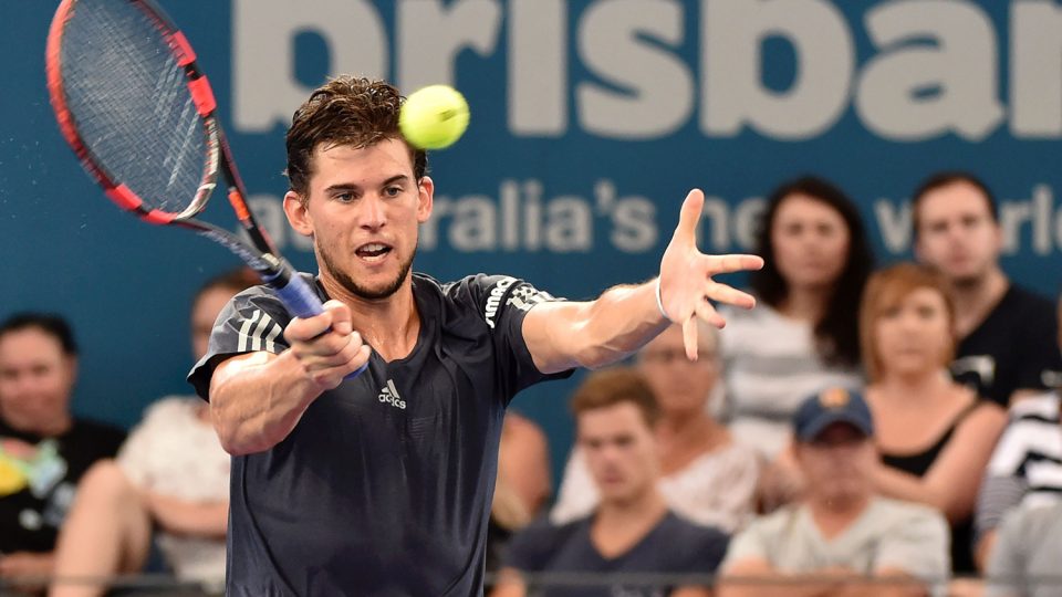 Austria's Dominic Thiem  hits a forehand against James Duckworth of Australia. Picture: GETTY IMAGES