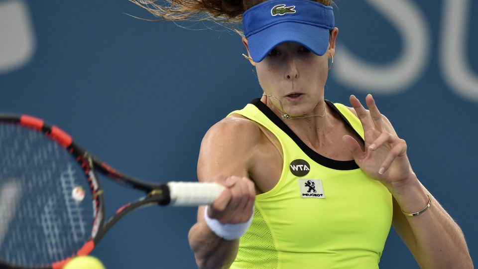 Alize Cornet of France hits a forehand against Anastasia Pavlyuchenkova. Picture: GETTY IMAGES