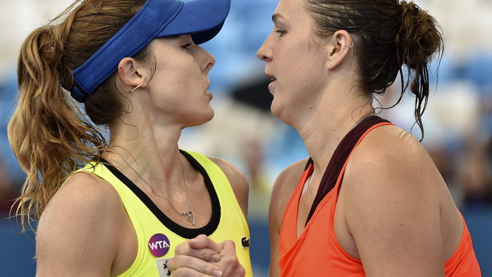 Anastasia Pavlyuchenkova of Russia shakes hands with Alize Cornet of France. Picture: GETTY IMAGES