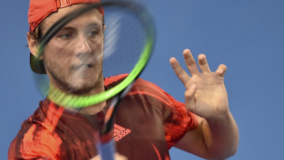 Lucas Pouille of France hits a return against Japan's Yoshihito Nishioka. Picture: GETTY IMAGES