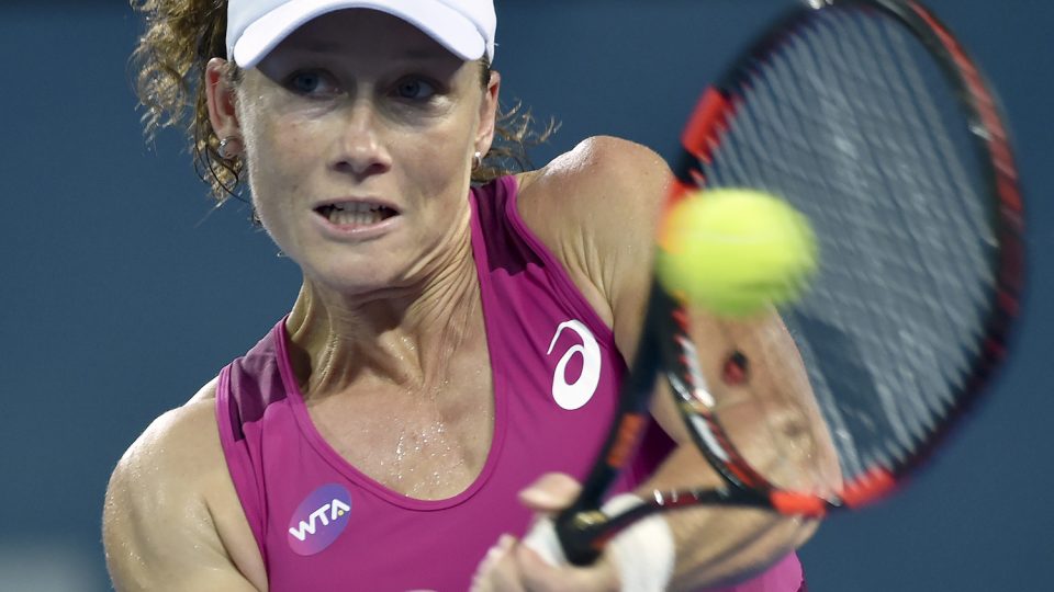 Samantha Stosur of Australia hits a return against Carla Suarez Navarro. Picture: GETTY IMAGES