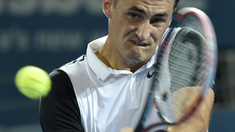 Australia's Bernard Tomic hits a backhand against Nicolas Mahut. Picture: GETTY IMAGES