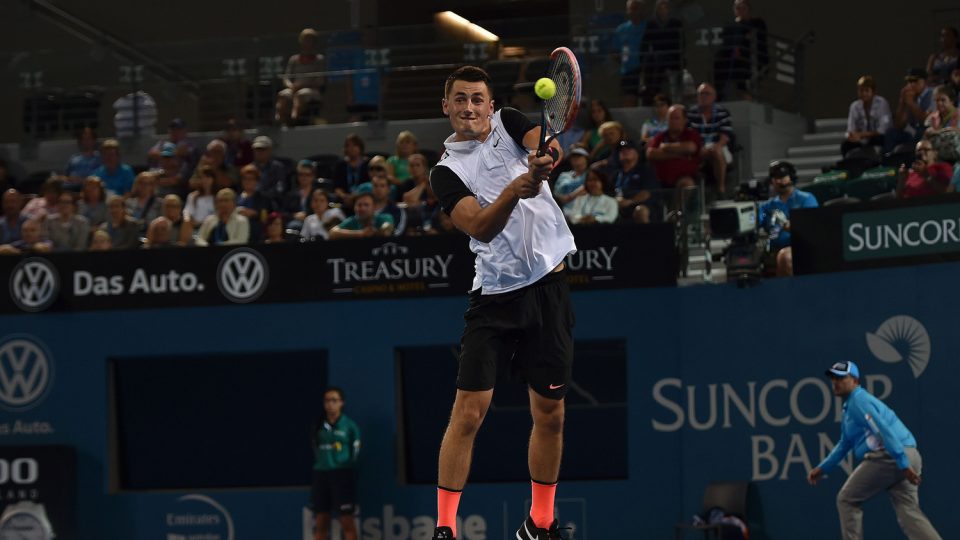 Australia's Bernard Tomic hits a return against Nicolas Mahut. Picture: GETTY IMAGES