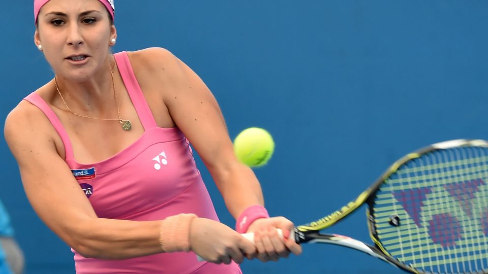 Switzerland's Belinda Bencic  hits a return against Samantha Crawford of the US. Picture: GETTY IMAGES