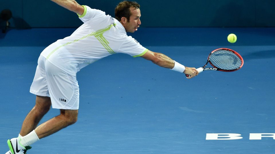 Radek Stepanek of the Czech Republic hits a return against Australia's Bernard Tomic. Picture: GETTY IMAGES