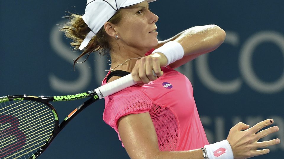 Varvara Lepchenko of the US hits a return against Garbine Muguruza of Spain. Picture: GETTY IMAGES