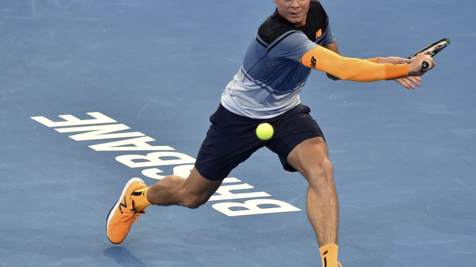 Milos Raonic of Canada hits a backhand against Croatia's Ivan Dodig. Picture: GETTY IMAGES