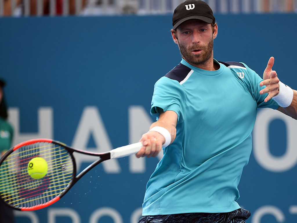 Stephane Robert hits a forehand in his loss to Mahout in Brisbane - PHOTO: Getty Images