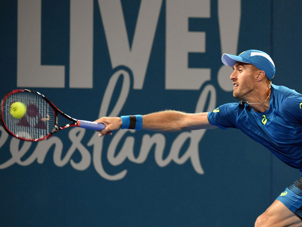 Steve Johnson stretches in his loss to Grigor Dimitrov - PHOTO: Getty Images