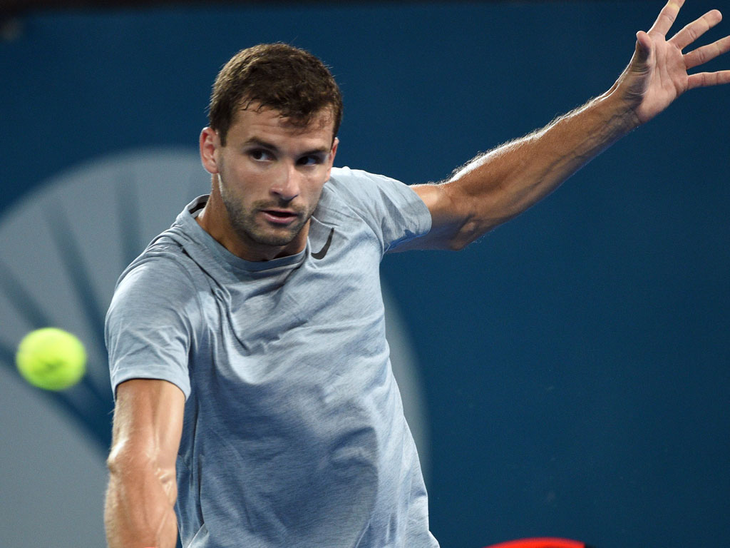 Grigor Dimitrov slices in his victory over Steve Johnson - PHOTO: Getty Images