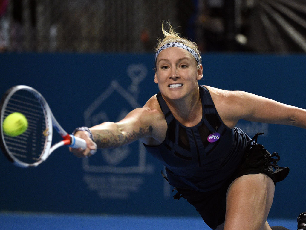 Bethanie Mattek-Sands reaches for a forehand against Destanee Aiava - PHOTO: Getty Images