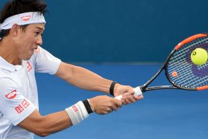 Kei Nishikori plays a backhand in his victory over Jared Donaldson - PHOTO: Getty Images